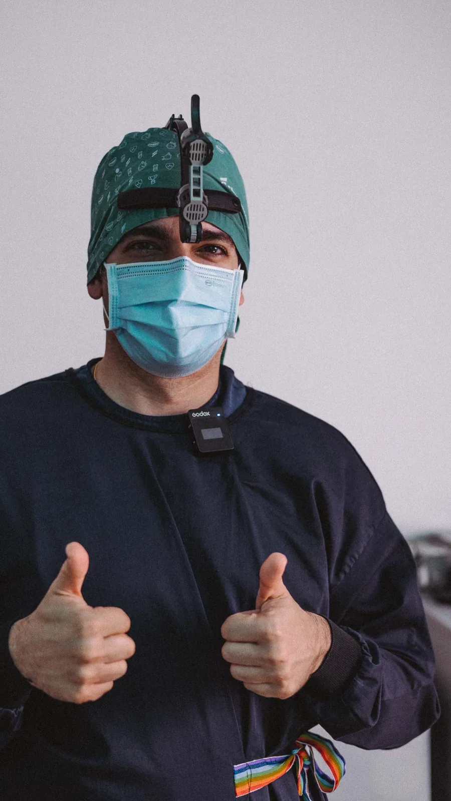 Dr. Dt. Ozan Akıncı in surgical scrubs